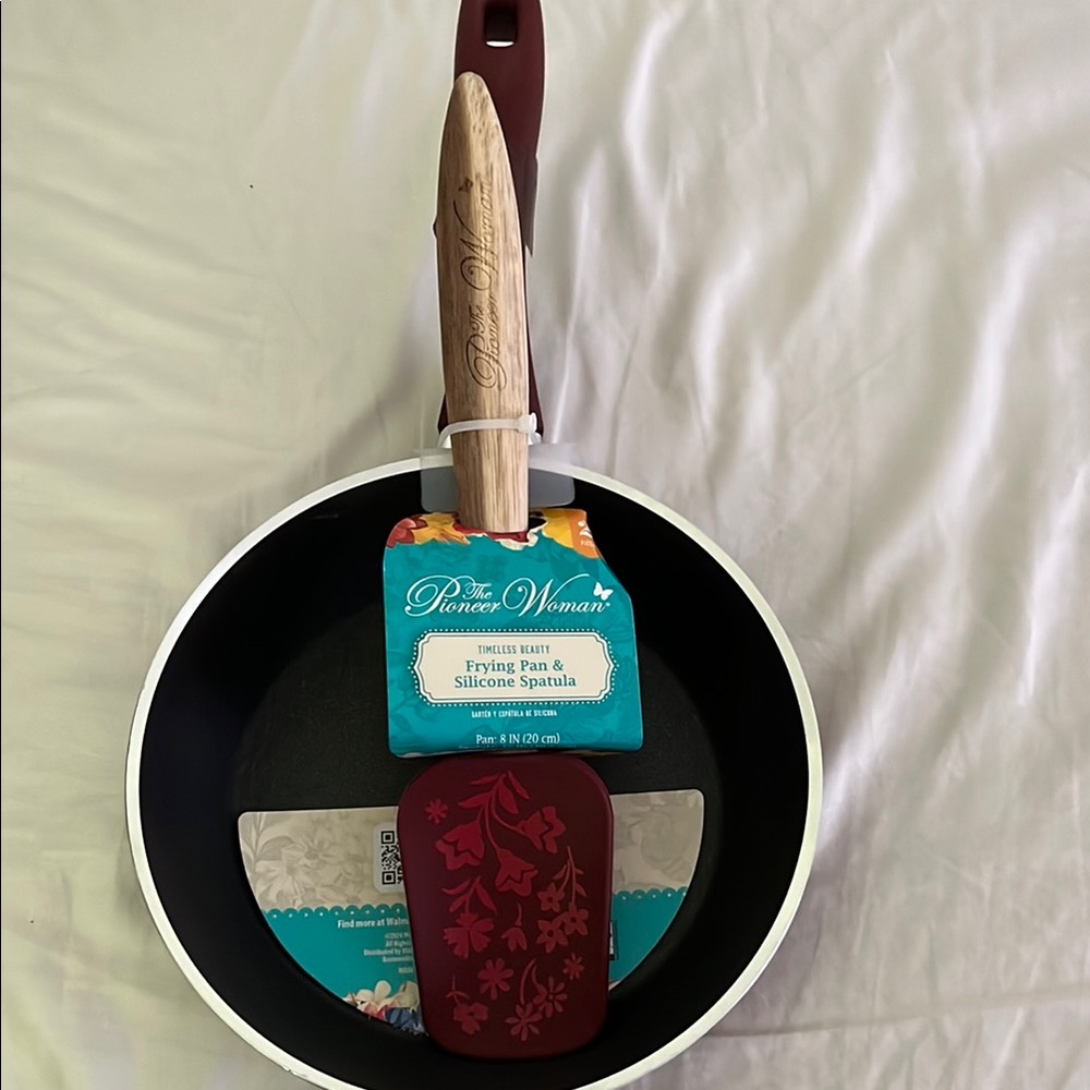 The Pioneer Woman Black Frying Pan with Red Floral Spatula